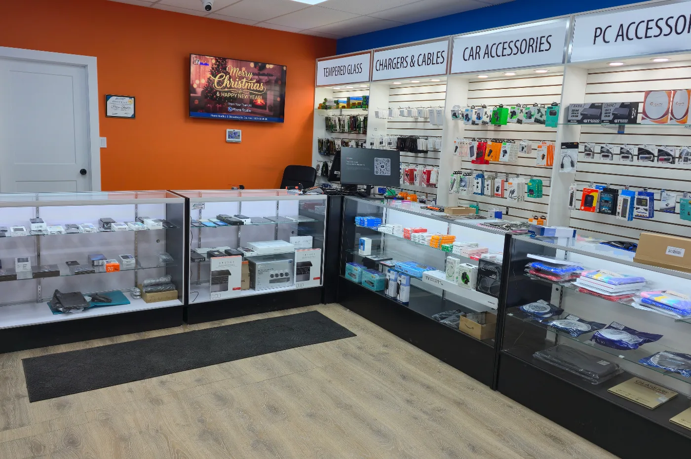 Phone Studio Courtice store interior with phone accessories and display cases